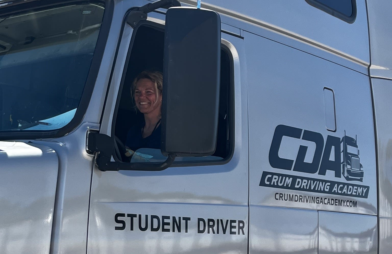 Driver behind wheel