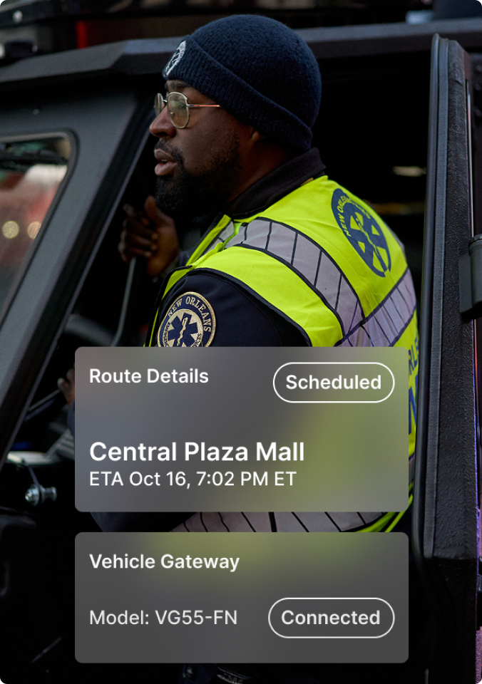 Emergency responder in high-visibility vest with route details overlay showing destination and vehicle connection status.