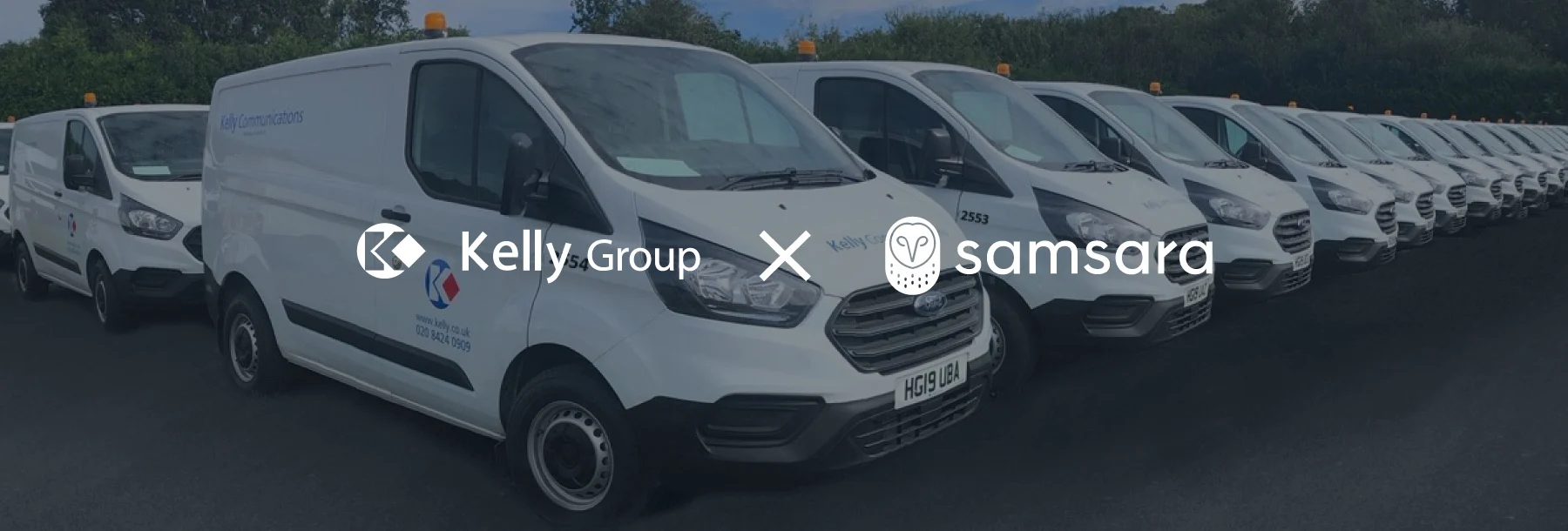Kelly Fleet Services fleet of white vehicles