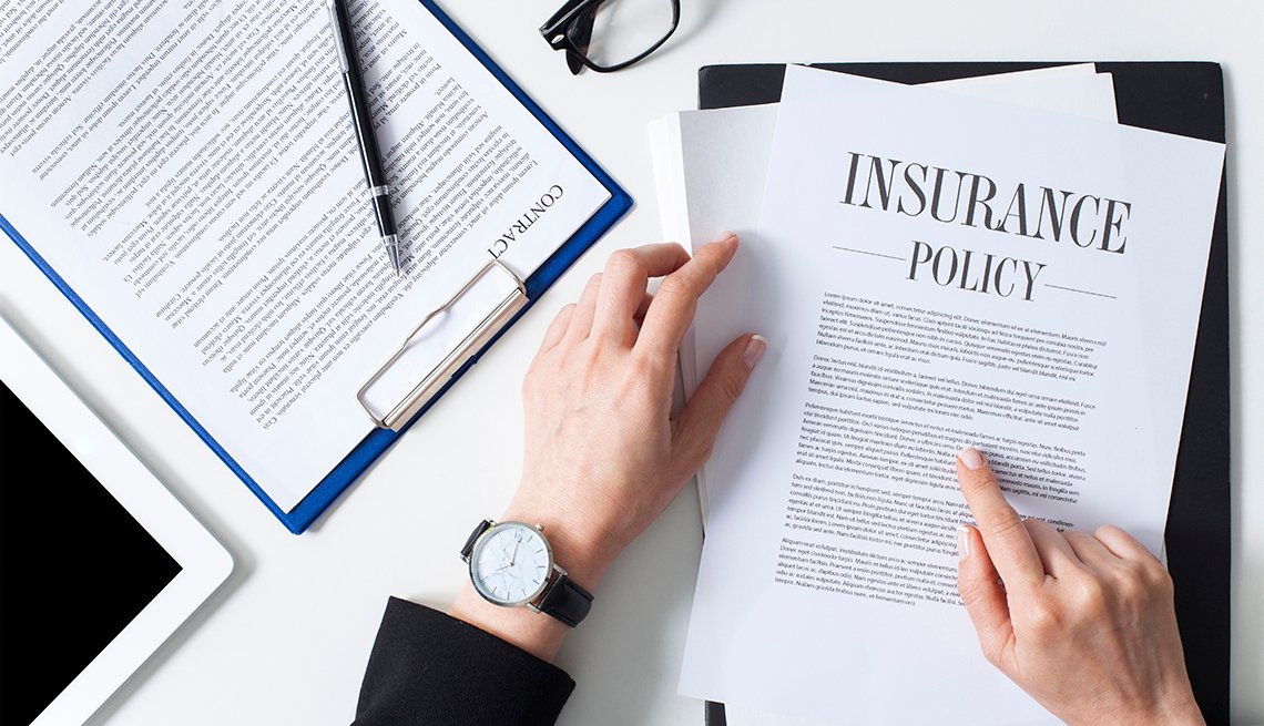 1140-woman-reading-insurance-policy.web 1140-woman-reading-insurance-policy.web