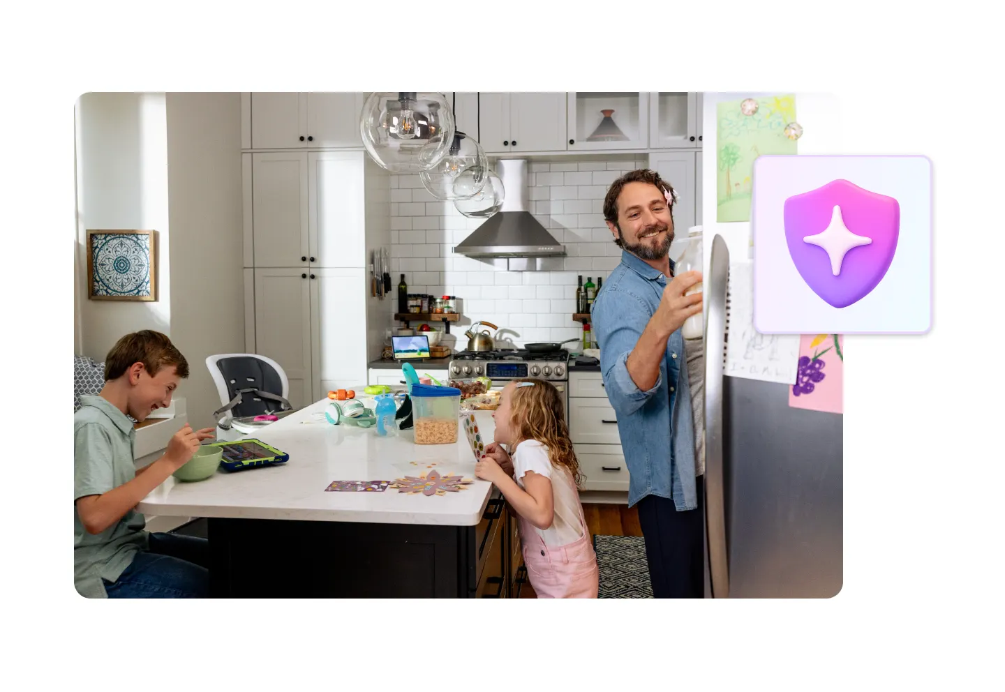 Family in kitchen with tech - Hero (short, half)