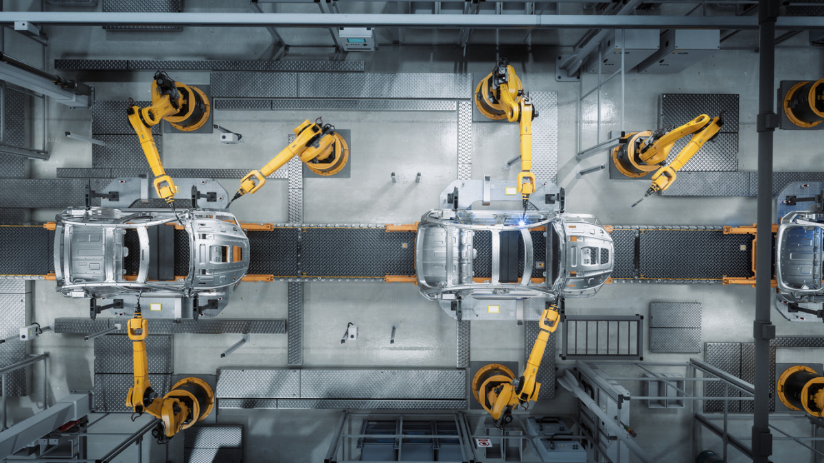 Overhead view of car being assembled in a factory