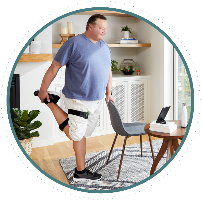 Hinge Health knee program participant Derek S. exercising his right leg