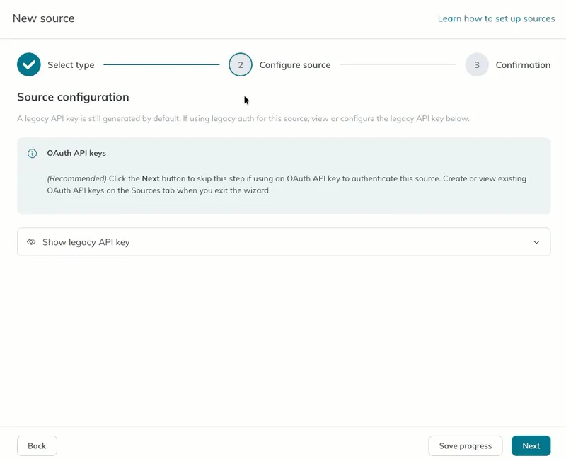 A user opens and closes the legacy API key settings in the source wizard. Then they click the Next button to proceed. A user opens and closes the legacy API key settings in the source wizard. Then they click the Next button to proceed.