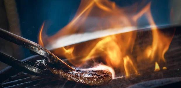 burger-cooking-on-bbq.jpg Steak on barbeque