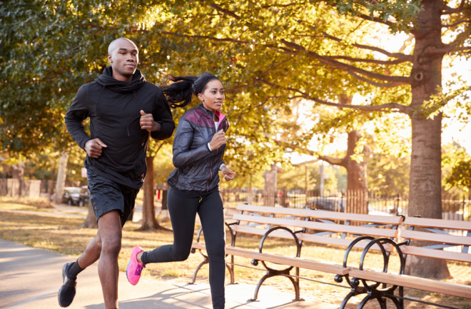 a young couple jogging in brooklyn - shutterstock