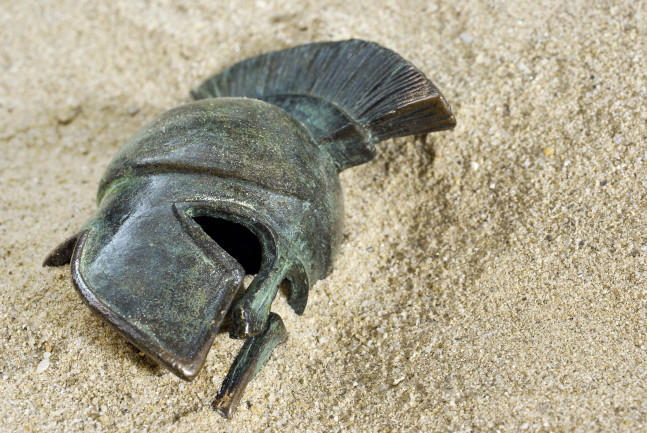 Greec helmet in sand