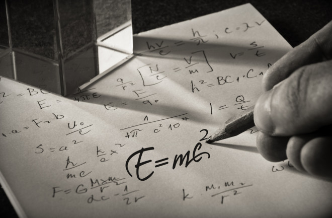 einstein's equation written on a piece of paper - shutterstock 476432692