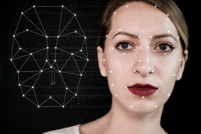 AI tech woman face technology deepfake - shutterstock