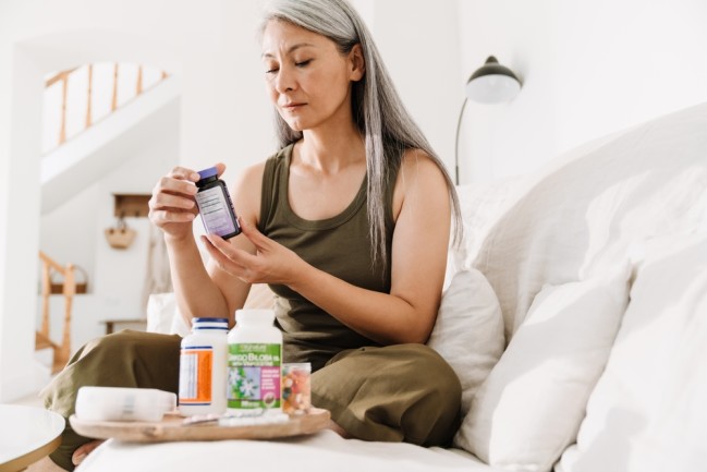 Woman taking supplements