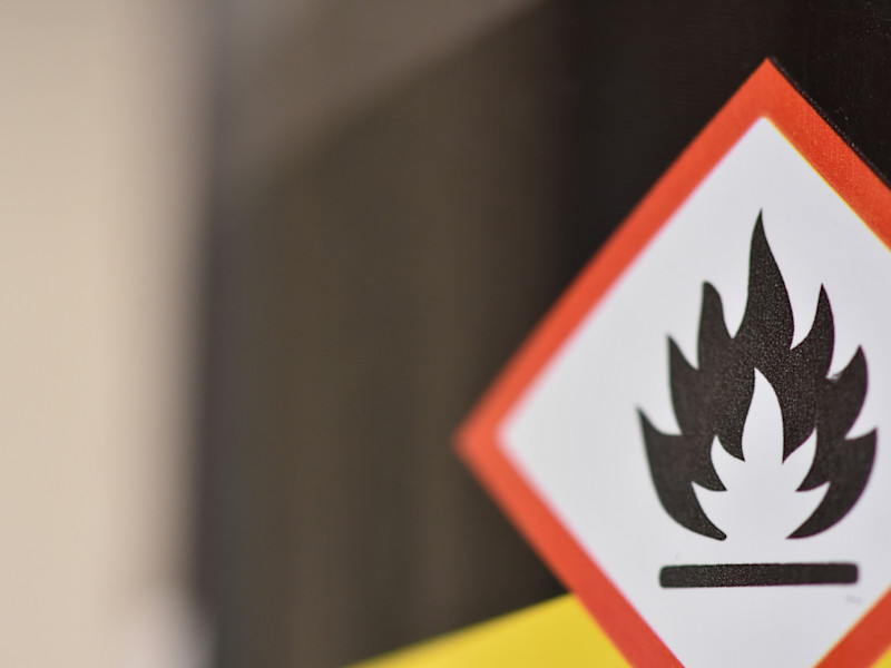 Diamond-shaped flammable sign.