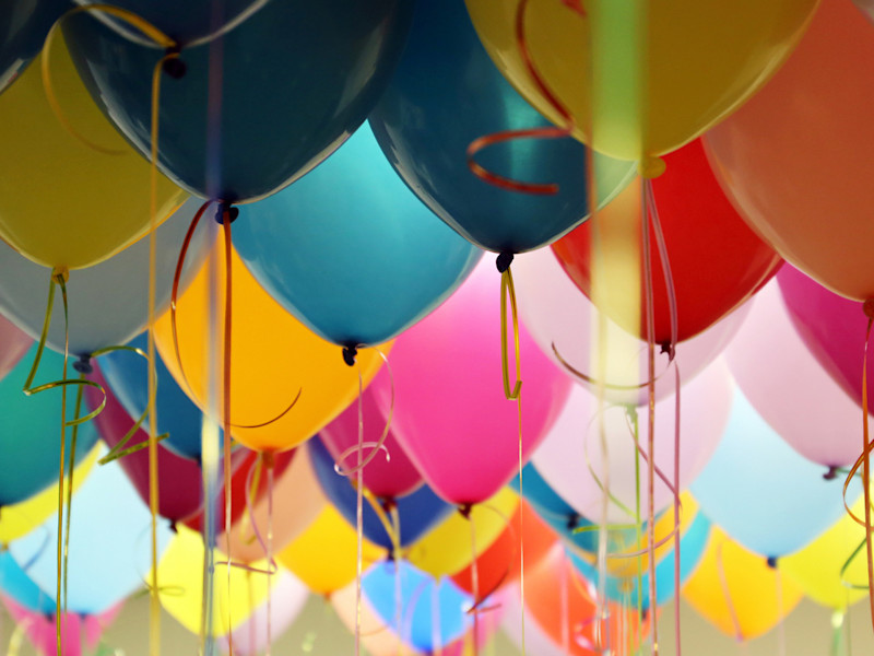 Room full of colorful balloons.