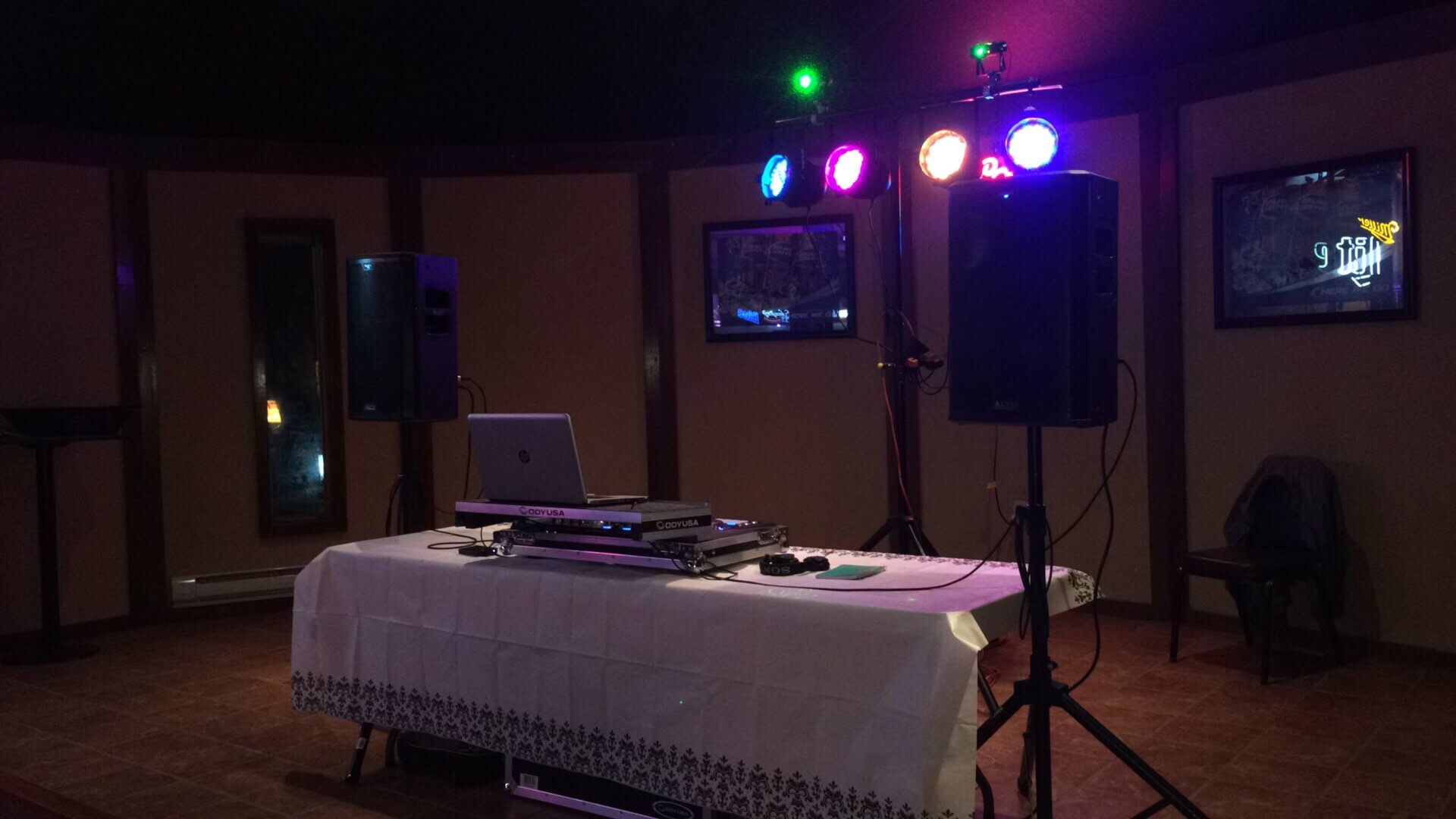 Static image of dj setup with lights and speakers