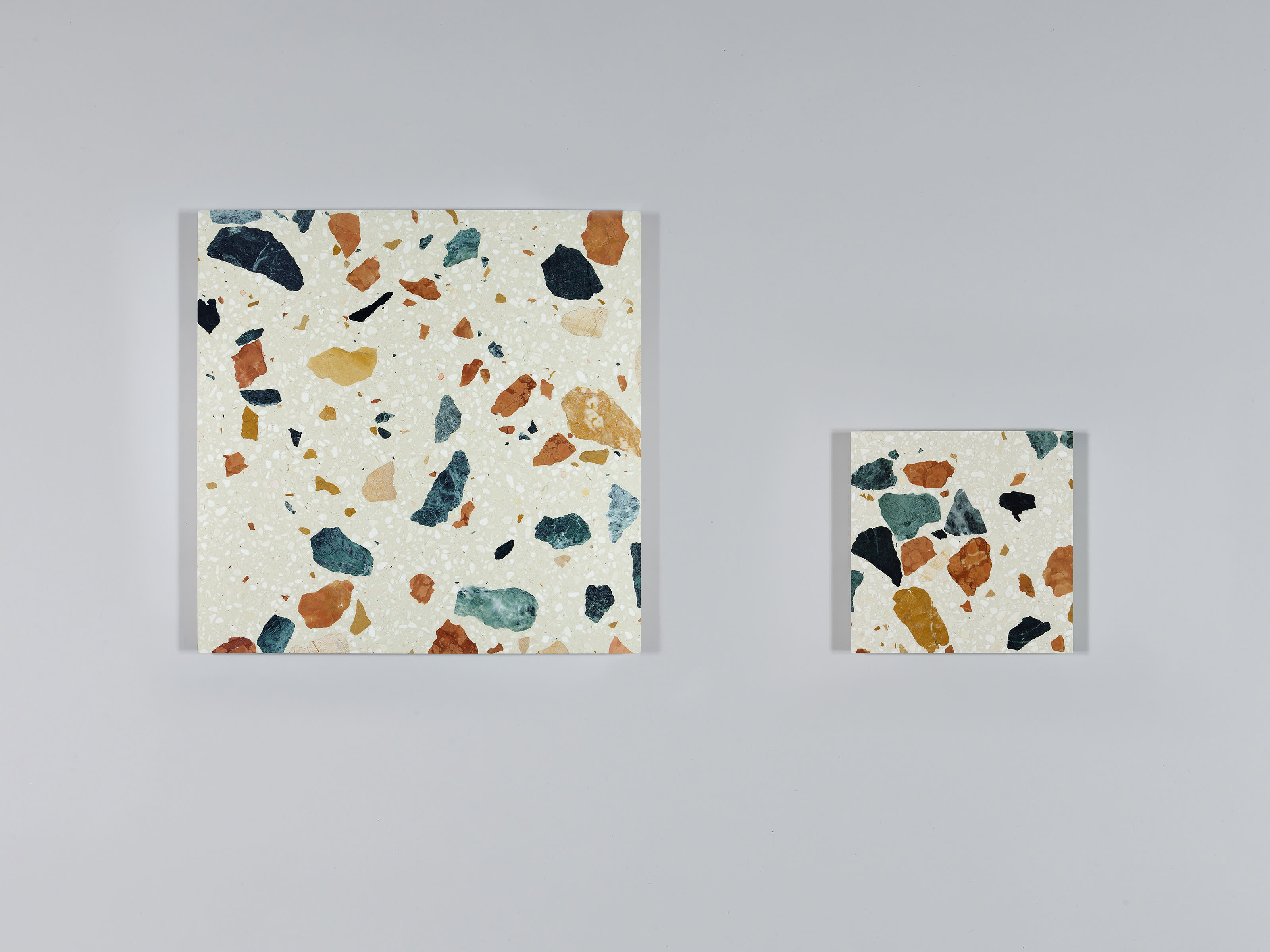 MARMOREAL WHITE TILES IN TWO SIZES, 600 ✕ 600MM AND 300 ✕ 300MM.
