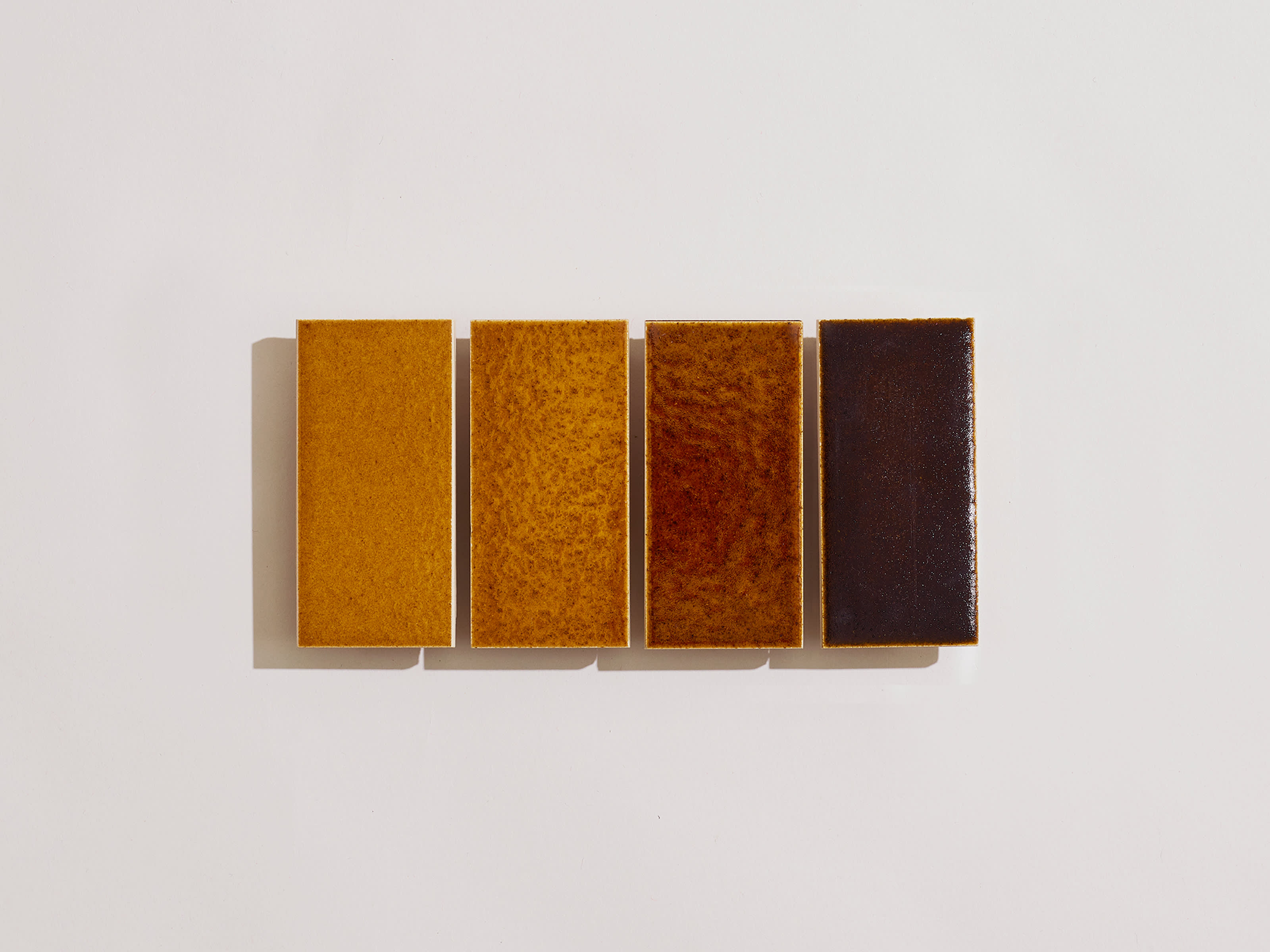 ExCinere Poly in the 95 ✕ 47mm format. Boxes contain a mix of glazes a,b,c,d.