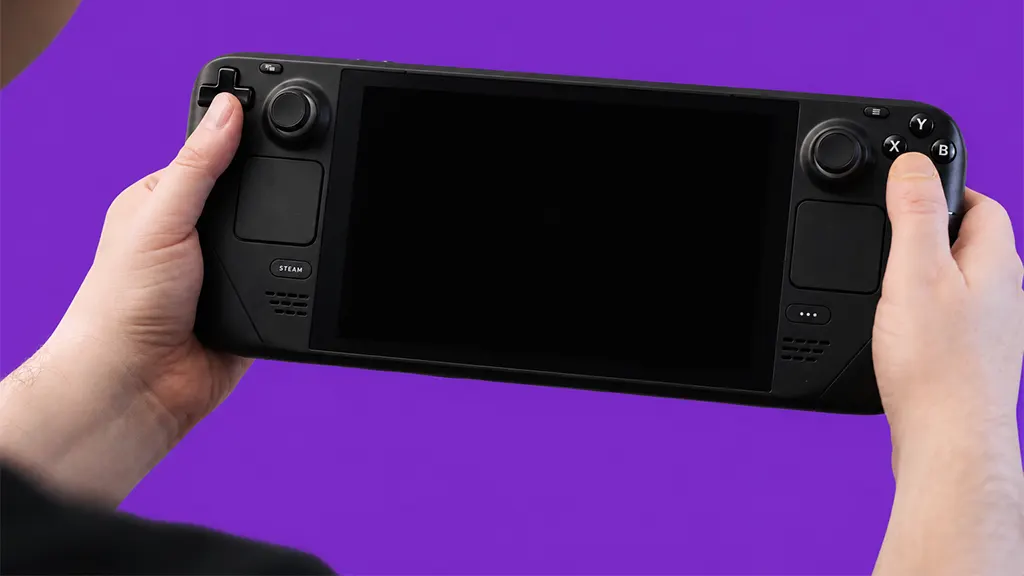Person holding a Steam Deck with buttons that have stopped working