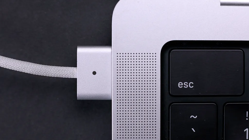 Charger plugged in and not charging MacBook