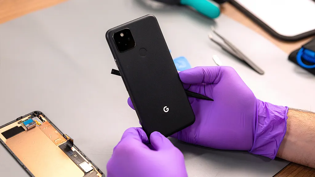 uBreakiFix expert working in store on Google Pixel battery drain