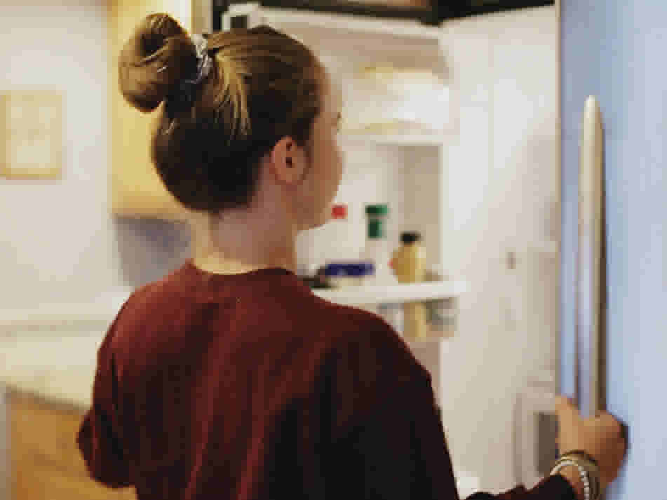 Flo's preparing lunch for tomorrow as part of her au pair duties