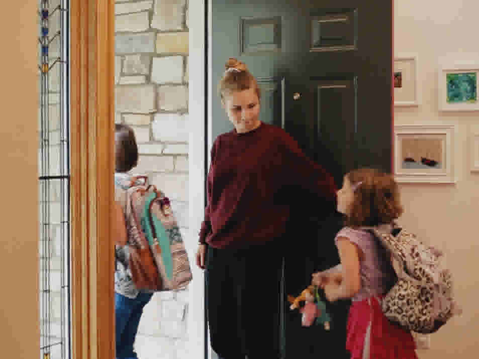 Flo walks children to school