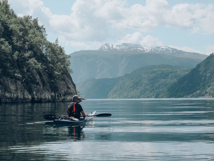 Paddling through the fjord