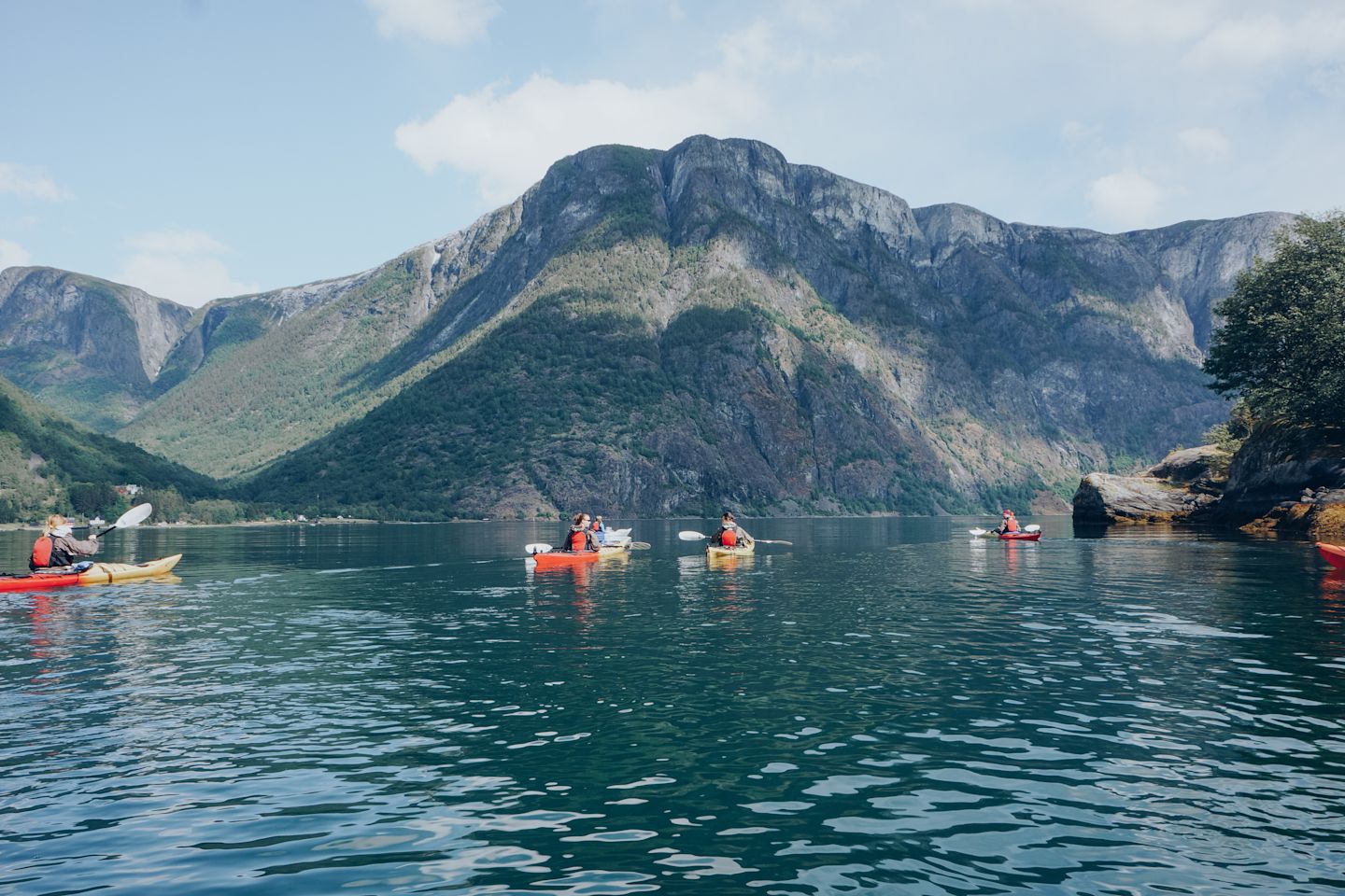 Kayaks gliding across the water