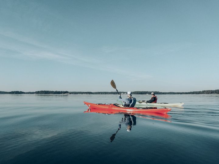 Kayaking through open waters