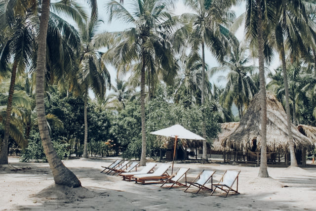 Deckchairs on the sand