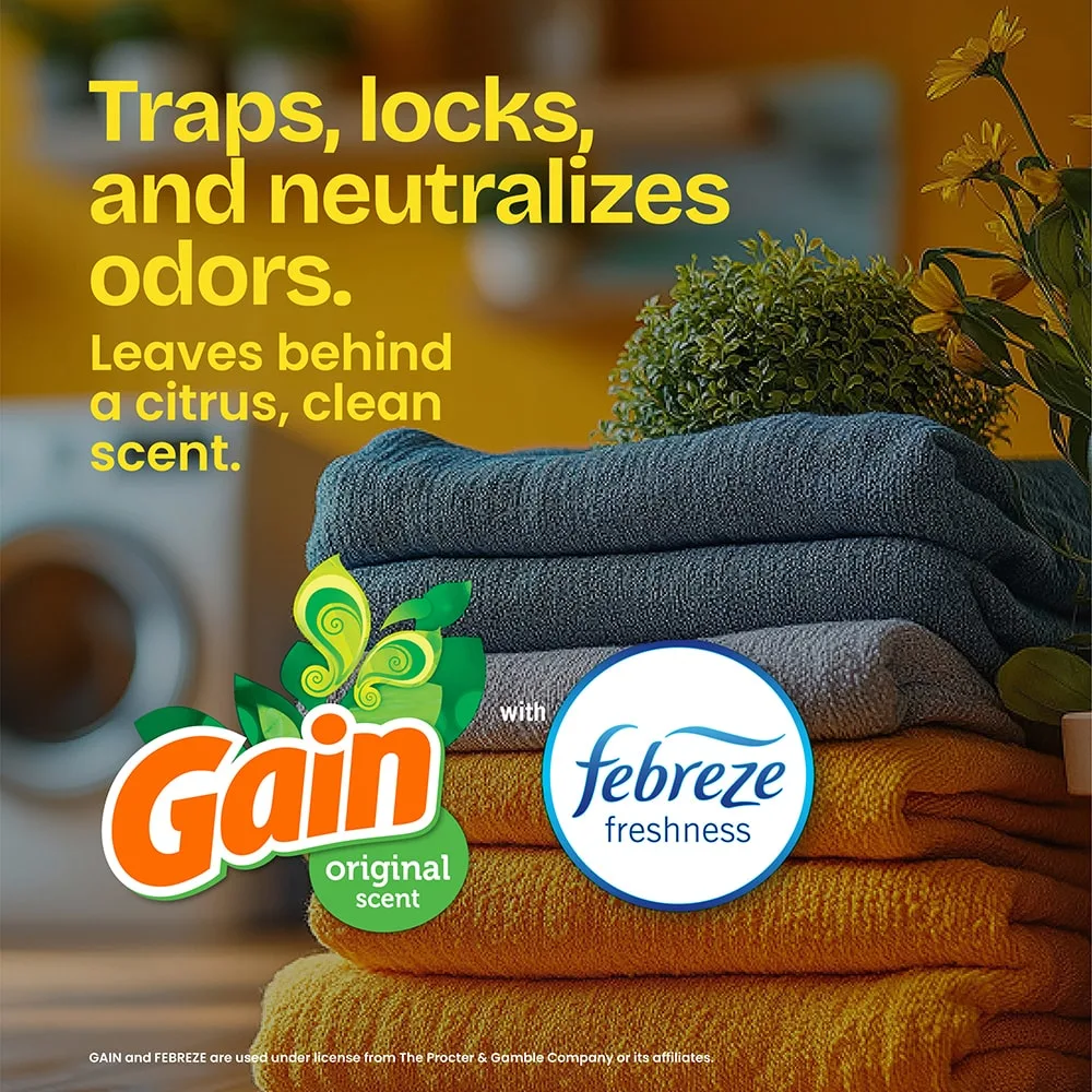 The words "Traps, locks and neutralizes odors. Leaves behind a citrus clean scent. Gain" and a febreze freshness logo over a laundry room with folded towels background