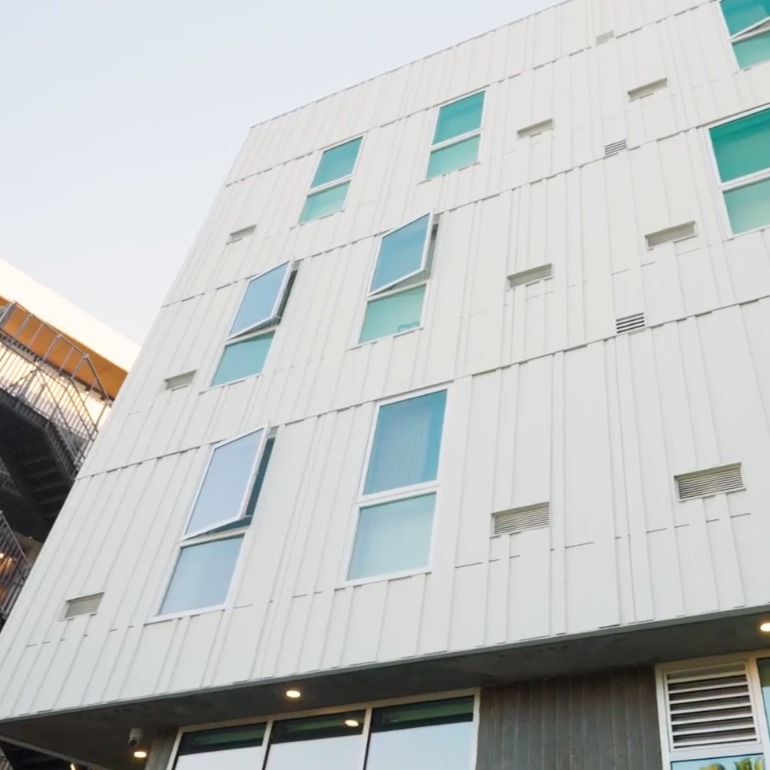 Hardie® siding elevates affordable housing with bold, innovative