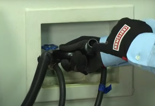 checking-the-washer-drain-hose-for-a-clog