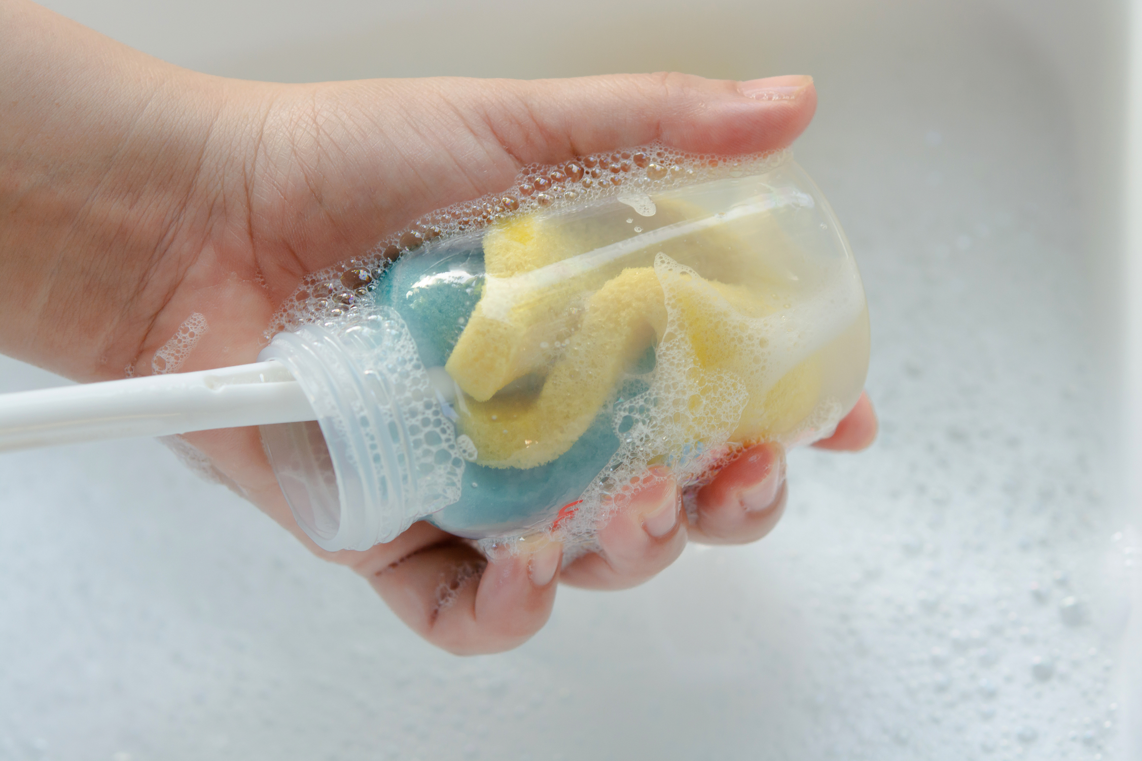hand-washing-a-baby-bottle
