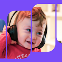 Lille barn med sorte høretelefoner på ørerne