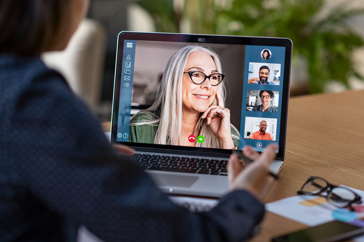 Financial advisor in video call with clients