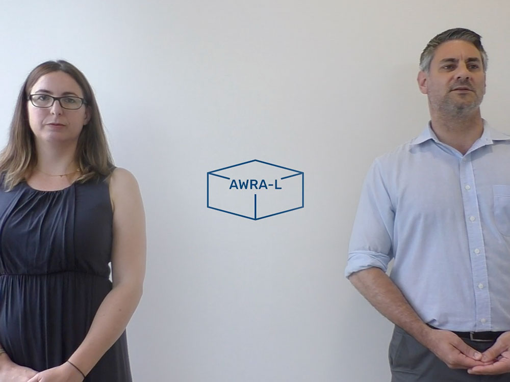 An image showing a video tutorial with two scientists from the Bureau of Meteorology introducing the AWRA-L data product.