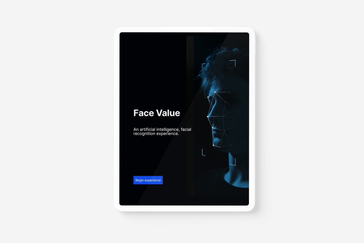 An image of the Face Value application's opening screen. The background shows a human face, with dots on key facial landmarks.