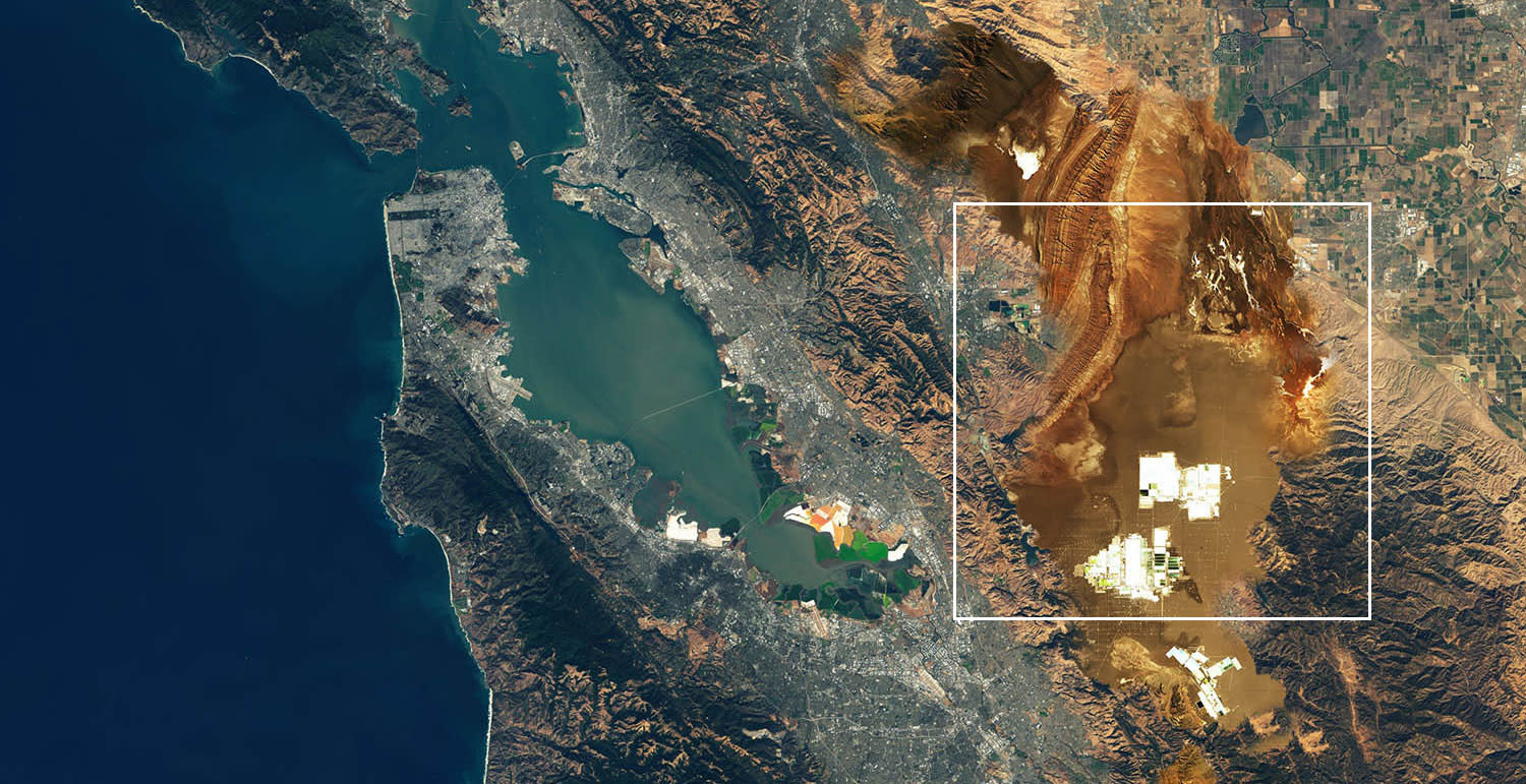Satellite imagery of the San Francisco Bay area, from Marin to San Jose, with a white bounding box over a group of white squares in the mountains in the East.