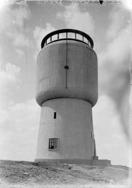 Black and white image of a water tank.