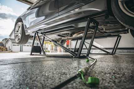 QuickJack Car Lift in a Home Garage