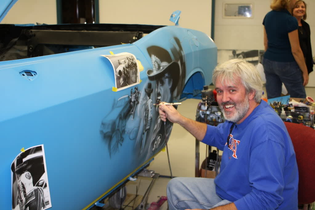 Custom Car Painter Creating Detailed Automotive Artwork