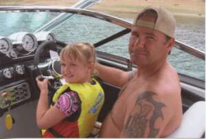 Gary Henthorn Boating With Child Family Lake Photo