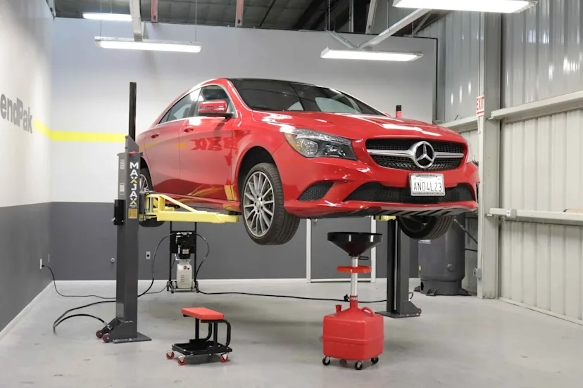 Red-car-MaxJax-portable-two-post-Lift