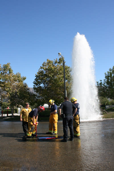 Emergency Crew Managing Water Main Break Flood