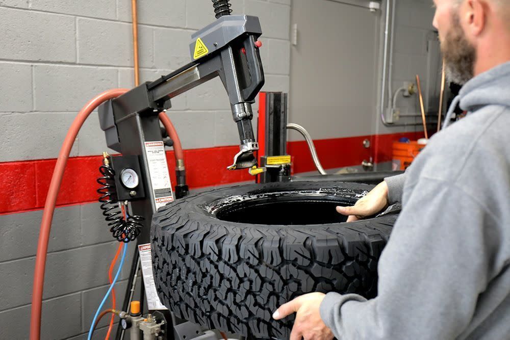 Ranger Tilt-Back Tire Changer Tower Design