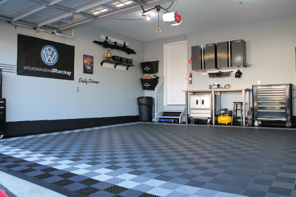 Clean Garage Interior Modular Floor Tiles Organized Workshop Space