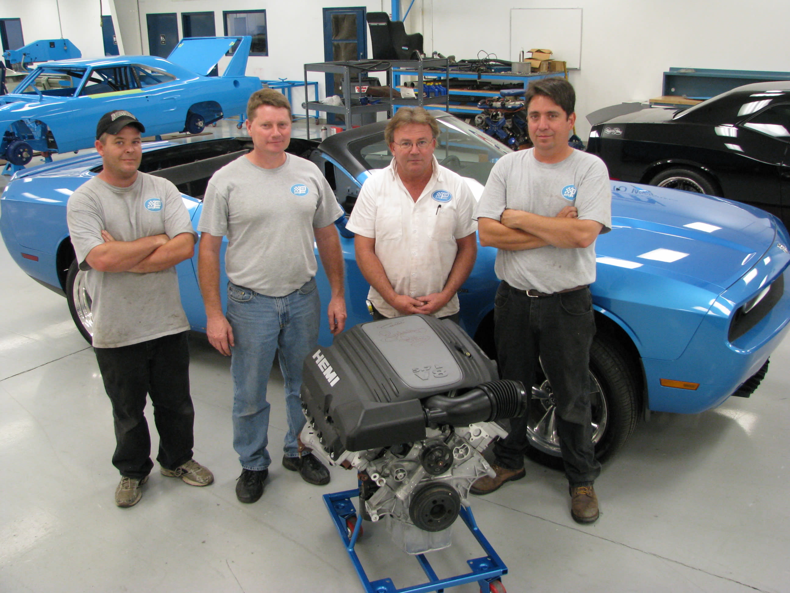Automotive Build Team With HEMI Engine And Custom Car