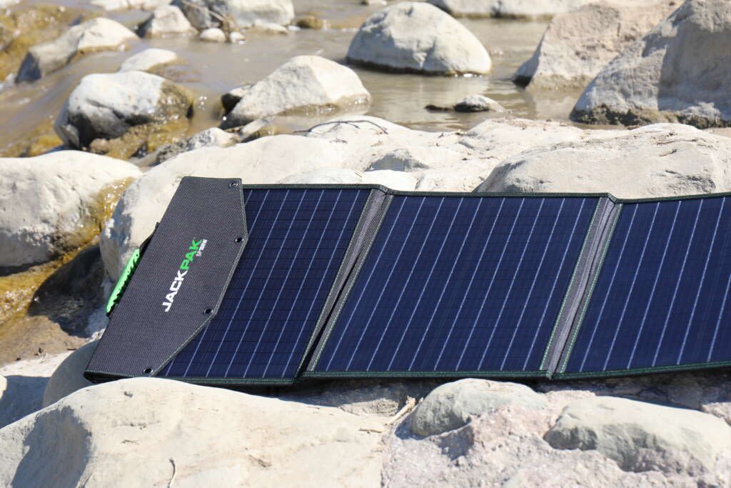 JackPak Foldable Solar Panel Charging Outdoors River