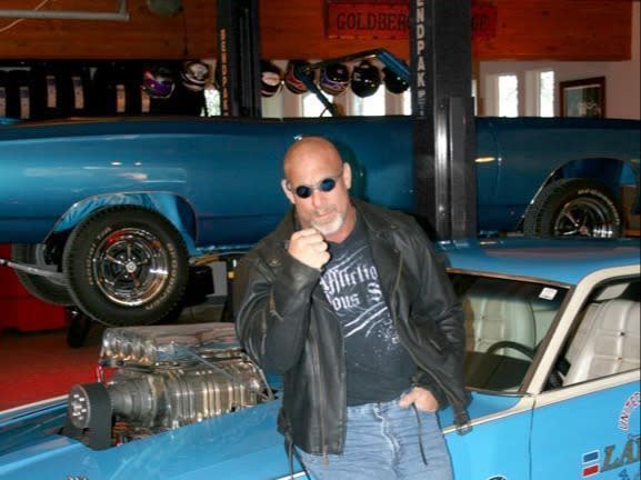 Bill Goldberg Lawman Mustang on BendPak Lift
