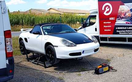 Porsche Boxster on QuickJack for Mobile Auto Repair