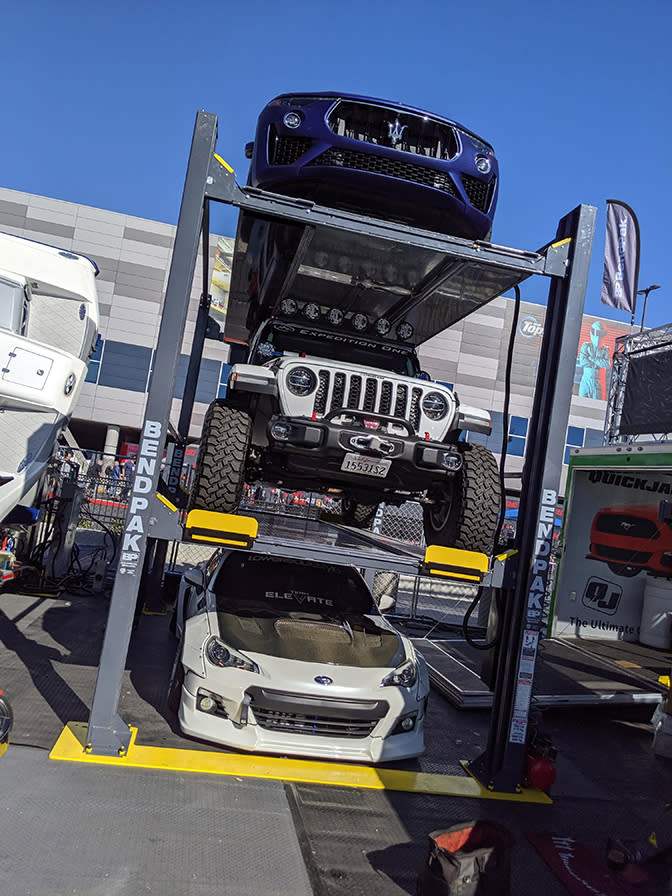 BendPak Triple Stacker Car Lift Display at SEMA Show